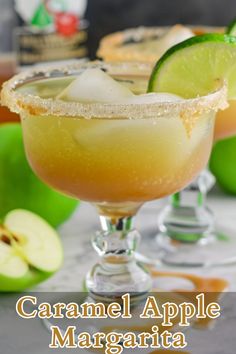 caramel apple margarita with lime and salt garnished in sugar on the rim