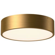 a round light fixture with a gold finish