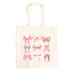 a white bag with pink bows on it