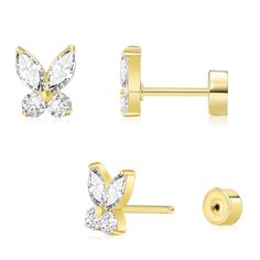 three pairs of gold earrings with cubics in the shape of butterfly and diamond wings