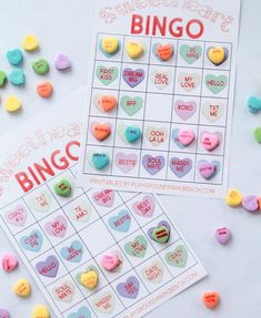 two printable valentine's day games with conversation hearts on them and candy candies scattered around