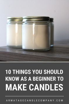 two jars filled with white candles sitting on top of a wooden table next to the words, 10 things you should know as a beginner to make candles