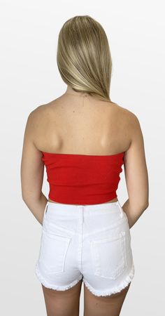 Look great on those hot game days! This tube top is a soft ribbed tee fabric with a triangle detail in front. Pair with your favorite bottoms to look great and keep cool on gamedays. Color- Red (Also Available in Dark Green, Blue, Burgundy , and Orange) 95% Polyester 5% Spandex Red Summer Game Day Tops, Fitted Tops For Game Day In Spring, Trendy Ribbed Bandeau Top, Casual Solid Color Bandeau Top, Sporty Red Cropped Tops, Trendy Tops For Game Day In Summer, Red Ribbed Crop Top For Summer, Sporty Bandeau Tops For Summer, Trendy Red Top For Game Day