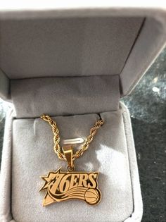 "Important Note Kindly be aware that hand crafting your unique pendant takes time. Delivery periods typically range from 3-4 weeks, though international shipments may require more time. If you're purchasing for a special occasion, please plan accordingly. Your understanding is much appreciated. Are you a die-hard Sixers fan? Show your support in style with this beautiful 18k gold plated or silver plated pendant necklace featuring the iconic quote \"Trust the Process\" engraved on the back. But the fun doesn't stop there, you can also personalize the back with your own special message or date! Features: 18k gold plated or silver plated pendant 50 cm rope chain included Beautiful jewelry box included Personalizable with your own message or date Kindly note: Our hand-engraved jewelry is made Hand Engraved Jewelry, Basketball Gifts, Personalized Pendant, Trust The Process, Unique Pendant, Die Hard, Hand Engraving, Rope Chain, Custom Engraving