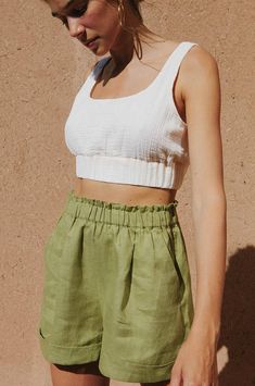 Our elevated version of a sporty crop top. We like to call it 'sophisty-comfy'! It is crafted from super soft, 100% textured cotton with full lining and features an elasticated waistband for extra comfort. You can wear the top both front and back for either a soft curved or a V-neckline. Looks especially stunning with minimal golden jewellery on bare skin! Combine the MOMENT Top with our SUMMER linen shorts or EASE hemp pants for effortless sophistication. Wear it with our linen SUMMER Shorts. ⌵ Sunshine Outfit, Hemp Pants, Summer Linen Shirt, Golden Jewellery, Sporty Crop Top, Shirt Dress Summer, Linen Summer, White Cotton Dress, Warm Dresses