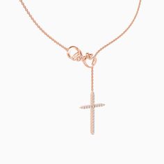 The paved cross pendant drop falls from a luxurious chain, creating an endless lariat necklace. On the other end, a polished infinite symbol consists of a word of love standing elegantly on the cross's top. Love and faith living in the same line create a dazzling beauty on this whimsical necklace.Carat Weight: 0.132 ctStone Size: 1.1 mmStone Type: Moissanite/GemstoneNumber of Stones: 22 Stone Color: OptionalStone Shape: RoundChain Type: O-chainWidth: 20.5 mmHeight: 37.7 mmThickness: 3.5 mmMateri Elegant Cross Necklace With Adjustable Chain, Elegant Cross Pendant Lariat Necklace With Adjustable Chain, Elegant Cross Lariat Necklace With Adjustable Chain, Elegant Cross-shaped Lariat Necklace With Adjustable Chain, Elegant Cross Lariat Necklace, Elegant Cross Lariat Necklace Gift, Elegant Cross Lariat Necklace As A Gift, Elegant Cross Lariat Necklace For Gift, Elegant Silver Cross Lariat Necklace