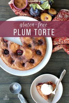 gluten - free plum torte with blueberries and whipped cream on top