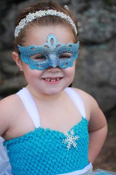 This blue mask captures the enchanting allure of an ice princess, adding a touch of frosty charm to your child's look. Whether your child is attending a costume party, a themed event, or simply wants to add a touch of elegance and fantasy to their playtime, this mask ensures they'll shine like true royalty.


Age Group/Gender - Kids

Size/Type - One size fits all kids

Mask Color - Blue

Mask Material - Polyresin

Accent Material - Paint Blue Costume Accessories For Carnival, Blue Costume Accessories For Carnival Party, Blue Carnival Costume Accessories, Themed Blue Costume Accessories For Party, Blue Themed Party Costume Accessories, Blue Masquerade Mask, Princess Mask, Blue Mask, Kids Mask