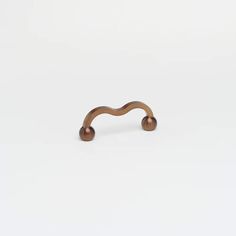 a wooden handle on a white background