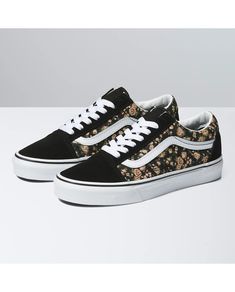 First known as the Vans #36, the Old Skool debuted in 1977 with a unique new addition: a random doodle drawn by founder Paul Van Doren, and originally referred to as the “jazz stripe.” Today, the famous Vans Sidestripe has become the unmistakable—and instantly recognizable—hallmark of the Vans brand. Featuring a vintage floral print that pops against a black background, the Rose Dreams Old Skool pays homage to our heritage while ensuring that this low top, lace-up shoe remains as iconic as ever. Vans Womens, Old School Vans, Van Doren, Custom Made Shoes, Beach Stores, Black Vans, Vintage Floral Print, Dream Shoes, Side Stripe