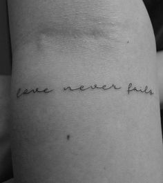 a woman's arm with the words, love never flies on her left side