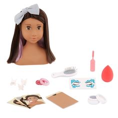 a doll with hair, makeup and other items for making it look like she's having fun