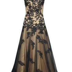 a black and gold dress with flowers on the bottom, in front of a white background