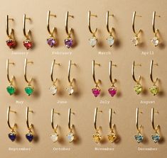 DescriptionWear your birthstone or gift someone theirs! These high-quality vermeil Huggies are made with heart-shaped, authentic stones and are the perfect addition to your effortless style. GuideJanuary - Red GarnetFebruary - AmethystMarch - AquamarineApril - White TopazMay - Green OnyxJune - Rainbow MoonstoneJuly - RubyAugust - PeridotSeptember - Blue SapphireOctober - OpalNovember - CitrineDecember - Swiss Blue Topaz Citrine Birthstone, Birth Stones, Nickel And Suede, Peridot Birthstone, Aquamarine Birthstone, Garnet Birthstone, Topaz Birthstone, Amethyst Birthstone, Sapphire Birthstone