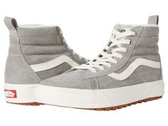 Vans SK8-Hi(r) MTE-1 - Shoes : Drizzle/Marshmallow : Skate in style and confidence with the Vans SK8-Hi MTE-1 sneakers. They'll never let you down! Leather upper. Lace-up closure with pull-on tab on heel notch. Round-toe silhouette. Textile lining and insole. Rubberized outsole. Imported. Measurements: Weight: 1 lb Product measurements were taken using size Men's 9, Women's 10.5, width Medium. Please note that measurements may vary by size. Weight of footwear is based on a single item, not a pai Winter Sporty High-top Sneakers With Textured Sole, Sporty Insulated Sneakers For Sports, Insulated Sporty Sneakers For Sports, Vans High-top Sneakers With Textured Sole, Vans Sporty High-top Sneakers With Rubber Sole, Insulated Low-top Sneakers For Sports, Functional Low-top Insulated Sneakers, Insulated High-top Sneakers For Outdoor Activities, Casual Mid-top Insulated Sneakers