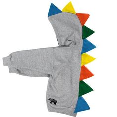 a child's hoodie with an animal on the front and colorful spikes on the back