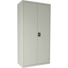 a large white cabinet with two doors