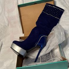 Long Blue Suede Style 1.5” Platform 5.25” Heeled Pull On Boots 14.5” In Length As Pictured With Gem Embellishments 6.75” Calf Width No Zipper Size 37 Kept In Shoe Covers In Box To Preserve Shoes! Never Worn! Smudge On One Part Of Platform Thigh High Boots Royal Blue, Blue Rhinestone Boots With Pointed Toe, Blue Pointed Toe Boots With Rhinestones, Blue Pointed Toe Boots For Formal Occasions, Blue Rhinestone Pointed Toe Boots, Formal Blue Pointed Toe Boots, Formal Fitted Blue Boots, Blue High Heel Boots For Evening, Elegant Blue Boots For Formal Occasions