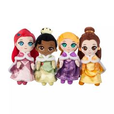 disney princess dolls are lined up on a white background