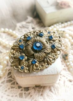 Antique Wedding Brooch With Intricate Design, Victorian Wedding Brooches With Intricate Design, Heirloom Wedding Brooches With Intricate Design, Ornate Blue Brooches For Wedding, Ornate Blue Wedding Brooches, Victorian Jeweled Wedding Brooches, Ornate Wedding Brooch With Intricate Design, Ornate Wedding Brooches With Intricate Design, Antique Jeweled Brooch For Wedding