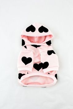 a pink and black dog hoodie with hearts on it