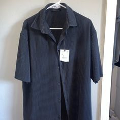 Black Button Up From Zar Ribbed Never Worn Black Relaxed Fit Shirt With Buttons, Zara Black Collared Shirt, Zara Black Top With Button Closure, Western Black Button-up Shirt, Zara Black Button-up Tops, Black Solid Color Button-up Shirt, Zara Black Button-up Blouse, Washed Black Cotton Button-up Shirt, Unstructured Black Button-up Shirt