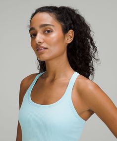 Embrace your movement. This soft tank is powered by seamless construction so you can move freely through your practice and beyond. Designed for Yoga. Intended to provide light support for B/C cups:Slim fit skims your body:Hip length sits below the waistband for moderate, everyday coverage:Light support is intended for low-impact activities. Built-in shelf bra for added support and coverage. Pockets for optional, removable cups. Racerback shape allows for full range of movement. Ebb To Street Tank, Miss Us, C Cup, Built In Shelves, Makeup Style, Top Light, Skin Concern, Shelf Bra, Sleeveless Tank Top