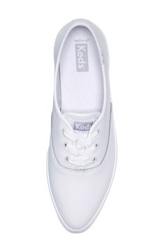 Update your sneaker rotation with this smooth leather platform kick boasting a stylish pointed toe and a cushioned footbed for all-day comfort. 1" platform Lace-up style Leather upper/textile lining/rubber sole Imported Keds, Up Styles, Leather Sneakers, Smooth Leather, White Leather, Leather Upper, Nordstrom, Lace Up, Sneakers