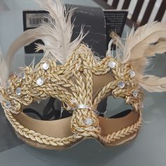 Halloween Gold Mask Masquerade Soft Feather At Top To Give Off A Elegant Look Accessorize With Braided Trim And Rhinestones Unique And Stylish Look Venice Masquerade Costumes, Song Concepts, Masquerade Accessories, Venice Masquerade, Short Platinum Blonde Hair, Lace Masquerade Masks, Masquerade Prom, Costume Masquerade, Simple Henna Tattoo