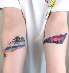 two people with matching tattoos on their arms