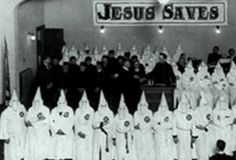 an old black and white photo of people dressed in costumes with the words jesus saves