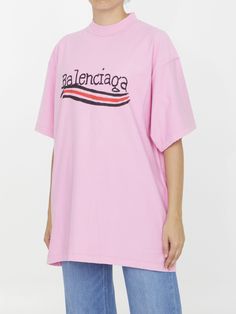 Short-sleeved crewneck t-shirt in pink cotton with Balenciaga logo on the front and on the back. Visible label detail at the back of the neck. Ribbed neck. Oversized fit. The model is 180cm tall and wears size 01. Size nationality: US Product number: 3059191 Product code: 720198TNVE71715 Composition: 100% cotton Balenciaga Logo, Platform Wedge Heels, Loafer Sneakers, Premium Brands, Dress With Cardigan, Clothes Collection, Cardigan Jacket, Pink Cotton, Logo T Shirt