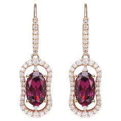 Celebrating Magenta as the color of the year for 2023, we present our exclusive Radiating Rhodolite collection. The magnificent magenta hues in these gems are brought to life in a classic rose gold setting with white diamonds. Rhodolite Drop Earring in 18 Karat Rose Gold with White Diamond. Rhodolite: 4.835 carat, 10X6mm size, Oval shape. White Diamond: 0.091 carat, 1.80mm size, round shape, G color, VS clarity. White Diamond: 0.15 carat, 1.50mm size, round shape, G color, VS clarity. White Diam Naha, Drop Earring, Color Of The Year, Gold Set, White Diamond, Diamond White, Round Shape, Or Rose, The Year