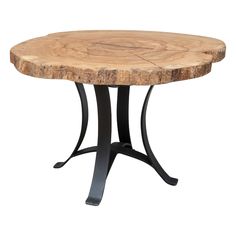 a round wooden table with metal legs