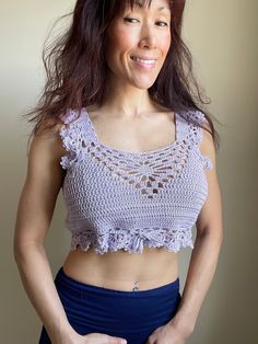 Beautiful handmade crochet summer cropped top in lavender purple color. Flower design on the center front and back, lace details on the straps and bottom hem. Made with 100 percent cotton yarn.  Size : Small Purple Crochet Lace Top For Summer, Purple Bohemian Crochet Top For Summer, Bohemian Purple Crochet Top For Summer, Purple Crochet Top For Summer Festival, Purple Crochet Lace Top For Spring, Bohemian Cropped Lace Crochet Top, Lavender Cropped Crop Top For Summer, Purple Bohemian Crop Top For Summer, Summer Crochet Lace Crop Top