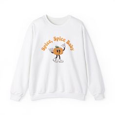 Get ready to embrace the cozy fall vibes with our hilarious Spice Spice Baby sweatshirt featuring an adorable pumpkin design! This fun and festive crewneck is perfect for all the pumpkin spice enthusiasts who live for that seasonal blend of cinnamon, nutmeg, and everything nice. Whether you're sipping on your favorite latte, strolling through a pumpkin patch, or just lounging at home, this sweatshirt will keep you stylish, warm, and full of autumn spirit. Crafted from a premium soft cotton blend, this sweatshirt is designed for ultimate comfort and durability. Its unisex fit makes it a versatile addition to your fall wardrobe, perfect for layering or wearing solo on crisp autumn days. It's the ideal sweatshirt for anyone who can't get enough of fall flavors and loves to keep things lighthe Cute Fall Streetwear Tops, Cute Sweater For Fall Streetwear, Cute Fall Sweatshirt For Streetwear, Cute Sweatshirt For Fall Streetwear, Cute Fall Streetwear Sweatshirt, Cute Streetwear Sweatshirt For Fall, Cozy Orange Crew Neck Top, Relaxed Fit Cartoon Print Top For Fall, Cute Long Sleeve Orange Top