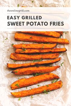 baked sweet potato fries on parchment paper with text overlay that reads easy grilled sweet potato fries