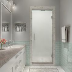 a bathroom with two sinks and a shower stall in it's center, surrounded by white cabinets