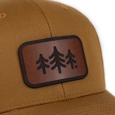 Description: Looking for a stylish and functional trucker hat? Look no further! This hat is made from high-quality materials and features a mesh back for breathability. The TriPine Leather Patch Trucker Hat is also adjustable, so you can find the perfect fit. Each leather patch is unique and may have natural blemishes. Hat Collection, Hot And Humid, Finding Peace, Leather Patches, Lifestyle Brands, Cotton Twill, Stitch Patterns, Trucker Hat, Perfect Fit