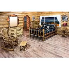 a log cabin bedroom with rocking chair and bed