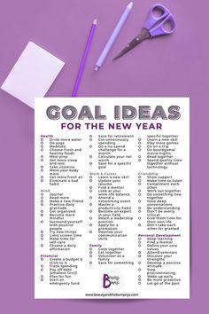 a purple poster with the words goal ideas for the new year next to some scissors