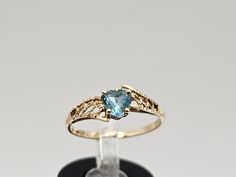 Vintage Dainty 10kt Yellow Gold Heart Cut Blue Topaz Ring Size 7  Item w#140 Clean and in good condition  Ring can be sized by your local jeweler 1.2 grams .57 carat heart cut Blue Topaz Gemstone Marked 10k Welcome to Westgate Jewels!! We specialize in vintage estate, designer, and fine jewelry. Our shop consists of items that are estate, antique, and / or vintage conditions unless otherwise noted. This means that most items are prior owned and may have some imperfections such as light scratches, scuffs, and / or patina. Our items are cleaned and polished professionally and inspected by our in-house jeweler. Items of gold or silver content are acid tested for accuracy of the metal content and may not always have a marking inside of the item due to the age or wear. Any flaws or damage will Vintage Native American Jewelry, Vintage Designer Jewelry, Blue Topaz Gemstone, December Birthstone, Blue Topaz Ring, Topaz Gemstone, Topaz Ring, Gold Heart, Native American Jewelry