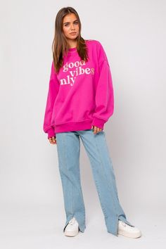 Hot pink long sleeve pullover sweatshirt with "Good Vibes Only" embroidery. relaxed oversized fit. Relaxed Fit Pink Hoodie With Ribbed Cuffs, Trendy Crew Sweats For Spring, Pink Casual Sweats For Fall, Casual Pink Sweats For Fall, Trendy Relaxed Fit Crew Sweats, Trendy Relaxed Fit Sweatshirt For Loungewear, Casual Pink Sweater With Ribbed Cuffs, Pink Casual Sweats For Winter, Trendy Relaxed Fit Sweats For Spring