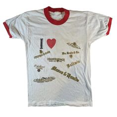 Rare Vintage 70s 80s Piano Brands T-Shirt. An "I Heart" Graphic And Then All Over Print With Different Piano Manufacturers Including Steinway & Sons, Kranich & Bach, Baldwin, Mason & Hamlin, Fischer New York, Wurlitzer, Packard, Aeolian, Ivers & Pond, Cable, Sohmer & Co, Madison, George Sterk, Wheelock, Henry J. Miller, Ford Piano Co., Duo/Art, Winter Company, And Weber New York. Light Wear And Age, A Few Light Spots/Stains But No Major Flaws. Men's Small, True To Size. Measurements Below. 23" Length 15.5" Width Duo Art, Art Winter, Heart Graphic, Ringer Tee, Vintage Tees, Vintage 70s, Branded T Shirts, Piano, Tee Shirts