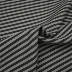 a close up view of a black and white striped fabric