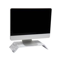 a computer monitor sitting on top of a white stand