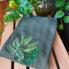 Hey, I found this really awesome Etsy listing at https://www.etsy.com/listing/1343376376/olive-botanical-frog-embroidered Green Embroidered Crew Neck Sweater, Green Cotton Sweater With Embroidered Graphics, Green Cotton Sweater With Embroidered Logo, Green Crew Neck Sweatshirt With Embroidered Text, Green Embroidered Crew Top, Green Embroidered Crew Neck Top, Casual Green Sweatshirt With Embroidery, Green Crew Neck Sweatshirt With Floral Embroidery, Green Long Sleeve Sweatshirt With Machine Embroidery