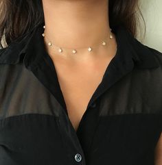 This gorgeous Gold Vermeil Dainty Cubic Zirconia Choker Necklace is the perfect piece of fashion jewelry to add a touch of elegance to any outfit. Whether worn as part of your everyday wear or to a more formal occasion you’ll be sure to shine! MEASUREMENTSThe Choker Necklace is made to be 11.5 inches long with a 2-inch adjustable chain providing a total length of up to 13.5 inches. SHIPPING & PACKAGINGAll items come packaged in a small jewelry box which is perfect for when buying as a gift f Classic Adjustable Necklaces For Party, Trendy Pearl Chain Jewelry For Formal Occasions, Dainty Diamond Necklace With Diamond Accents For Parties, Dainty Diamond Necklace With Accents For Party, Diamond White Necklaces For Party, Formal Diamond Clavicle Necklace, Formal Clavicle Chain Diamond Necklace, Elegant Diamond Necklace With Jewels For Party, Elegant Formal Delicate Chain Choker