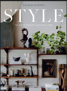 the front cover of style magazine, featuring books and vases on shelving units