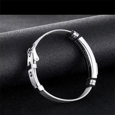 The Mens Stainless Steel Bracelet showcases a minimalist style that is quite on trend. The features include an adjustable mesh band with buckle clasp so that the bracelet can be easily adjusted to fit most men's wrist. The bracelet band width is 12mm, roughly 0.46 inches and the length can accommodate wrist from 6.5 to 8.5 inches. It is a fashionable mens bracelet that can work for all occasions, and can be gifted to teens, young men and older. This stainless steel bracelet is packaged with a je Stainless Steel Bracelet Men, Blue Words, Great Gifts For Men, Young Men, Jewelry Pouch, Steel Bracelet, Minimalist Style, Stainless Steel Bracelet, Custom Items